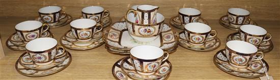 An Edwardian gilt and floral Paragon tea set